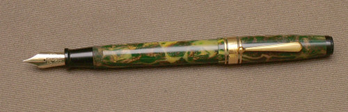 Aurora-Internazionale-50-GoldGreenCream-Calzata.jpg