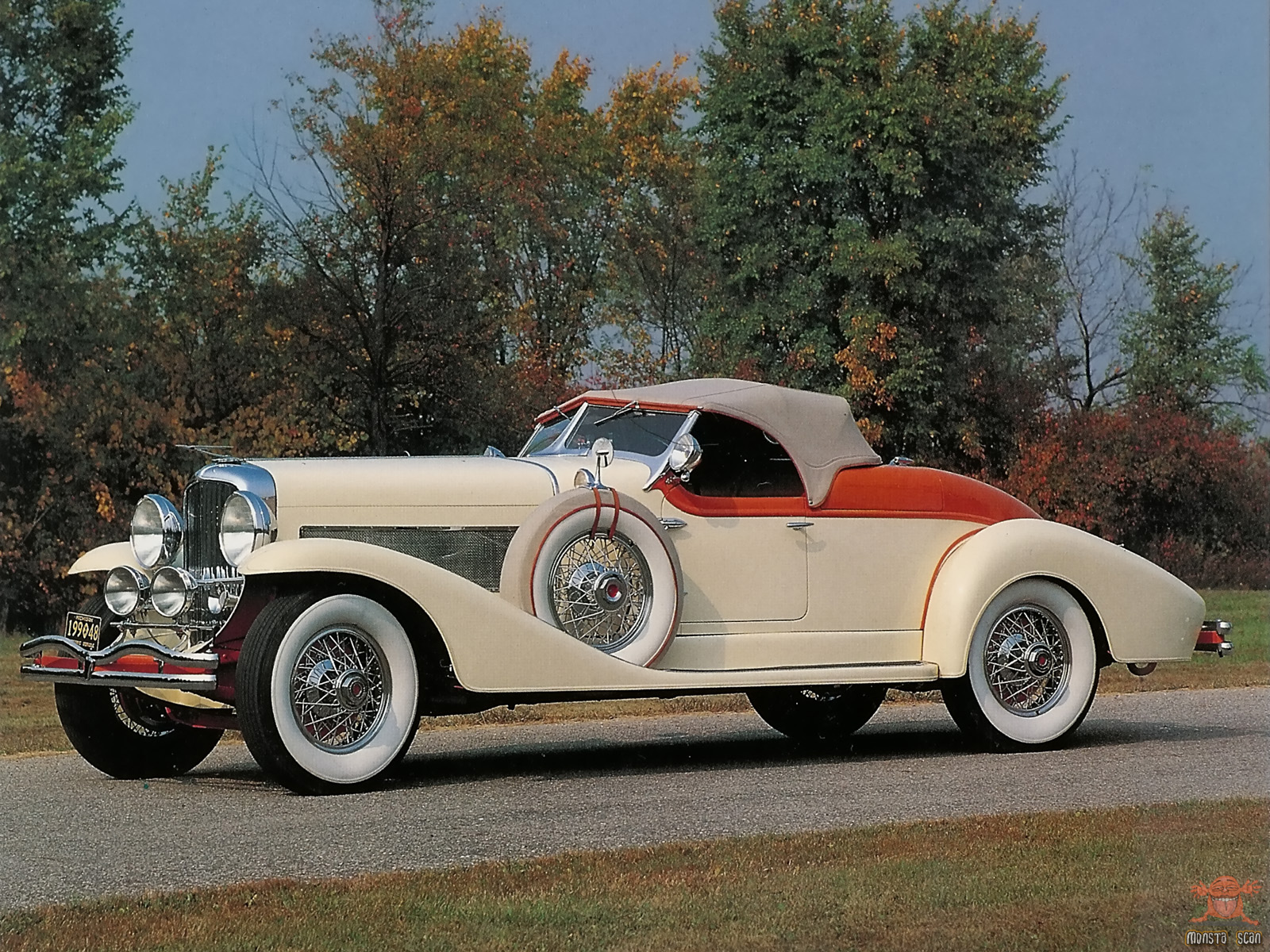 1933-04-1933-Duesenberg-SJ-Roadster-wall.jpg