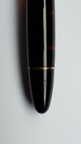 Vista del pomello rotante per la ricarica a stantuffo dell'inchiostro, con N. 149