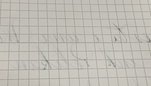 Retro del foglio, giusto qualcosina nei punti con più inchiostro