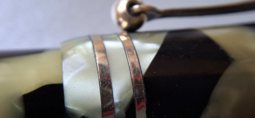47. WE1EP. Black and Pearl celluloid detail.jpg