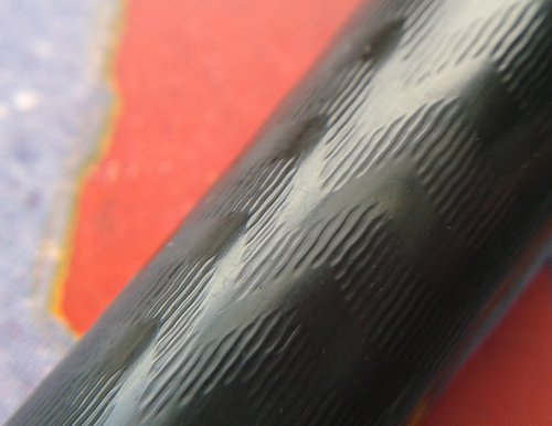 8. W12S. chased hard rubber detail.jpg