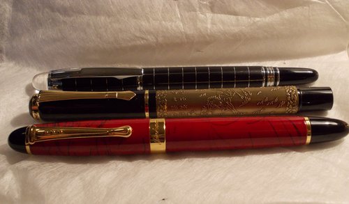 La Jinhao X450, la Baoer Eight Horses, e la Starwalker